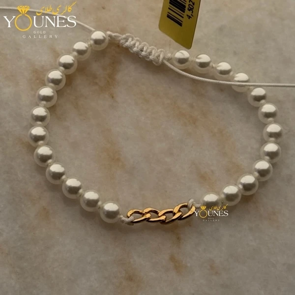 تصویر دوم دستبند طلا مراوریدی کارتیر چهار حلقه